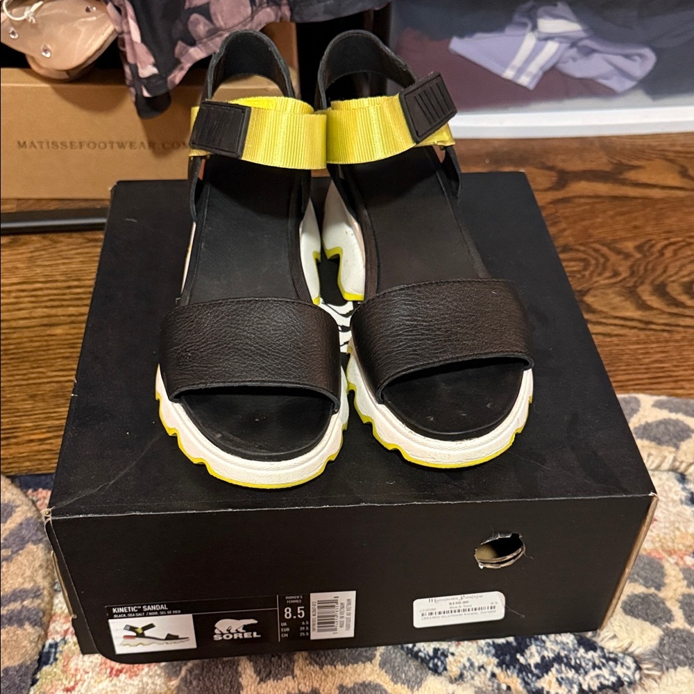Sorel Women's Black and Yellow Strap Sandals